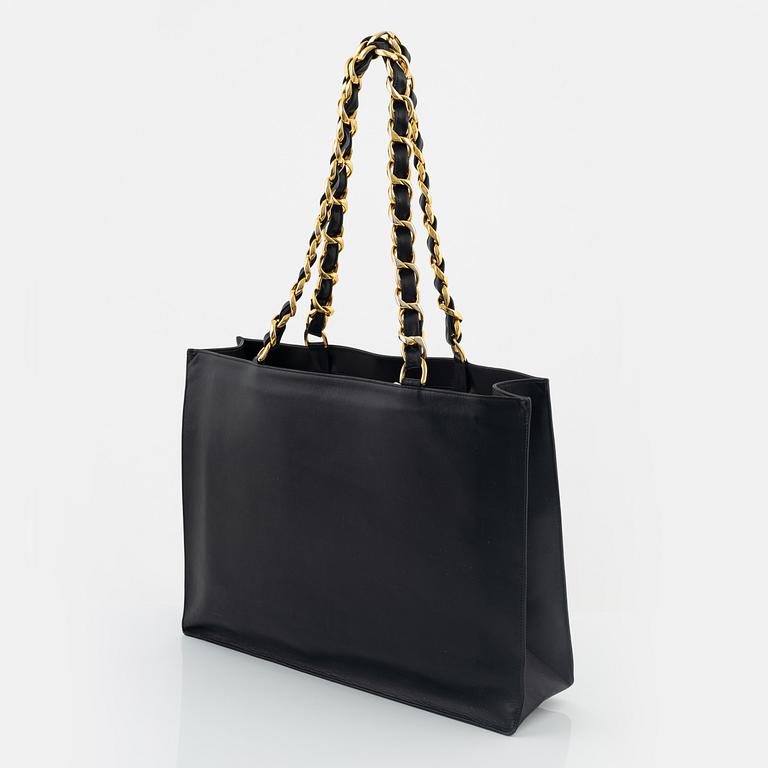 Chanel, a black leather and gold tone chain 'Shopper', 1991-1994.
