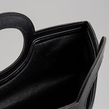 Christian Dior, a 'Oblique fold-over convertible clutch'.