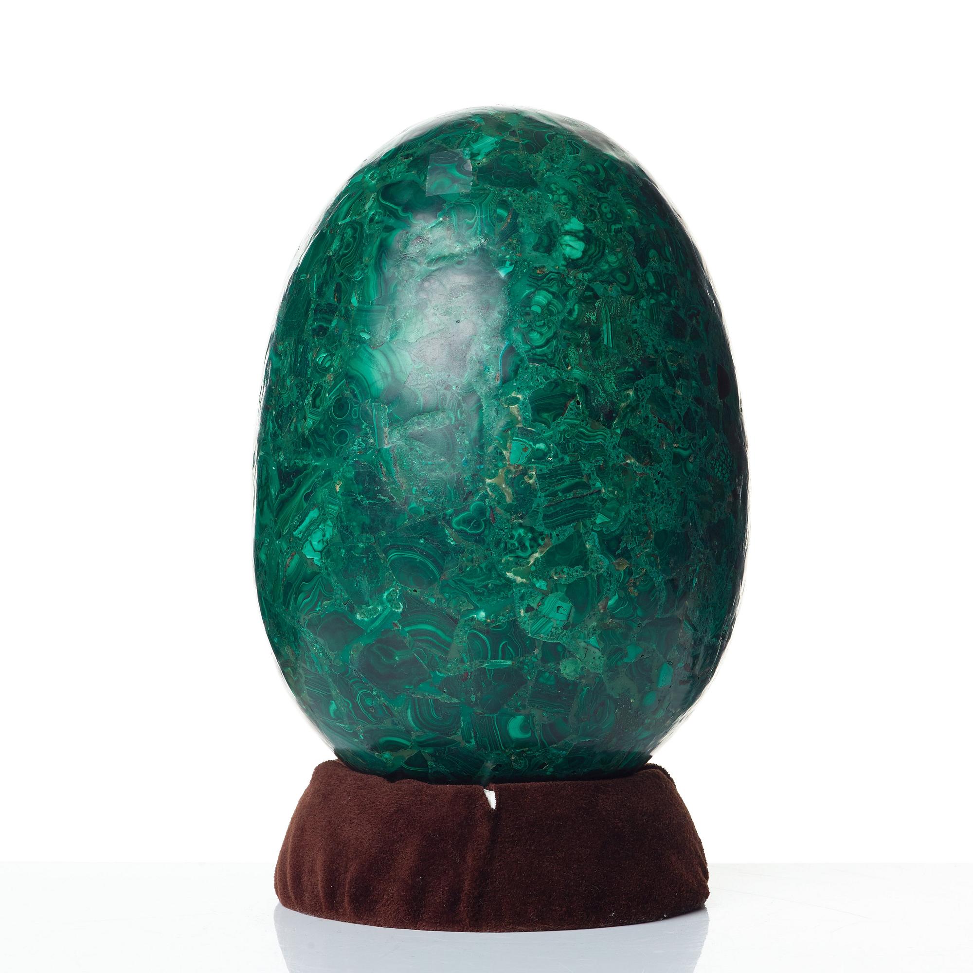 A Russian 19th Century malachite veneered egg.