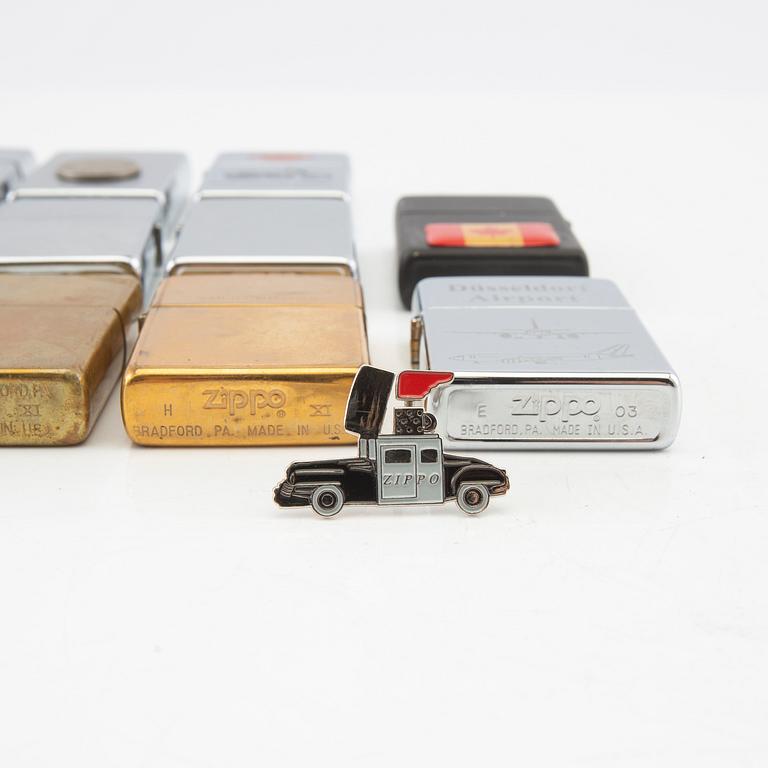A collection of 14 Zippo lighters, USA, latter part of the 20th century.
