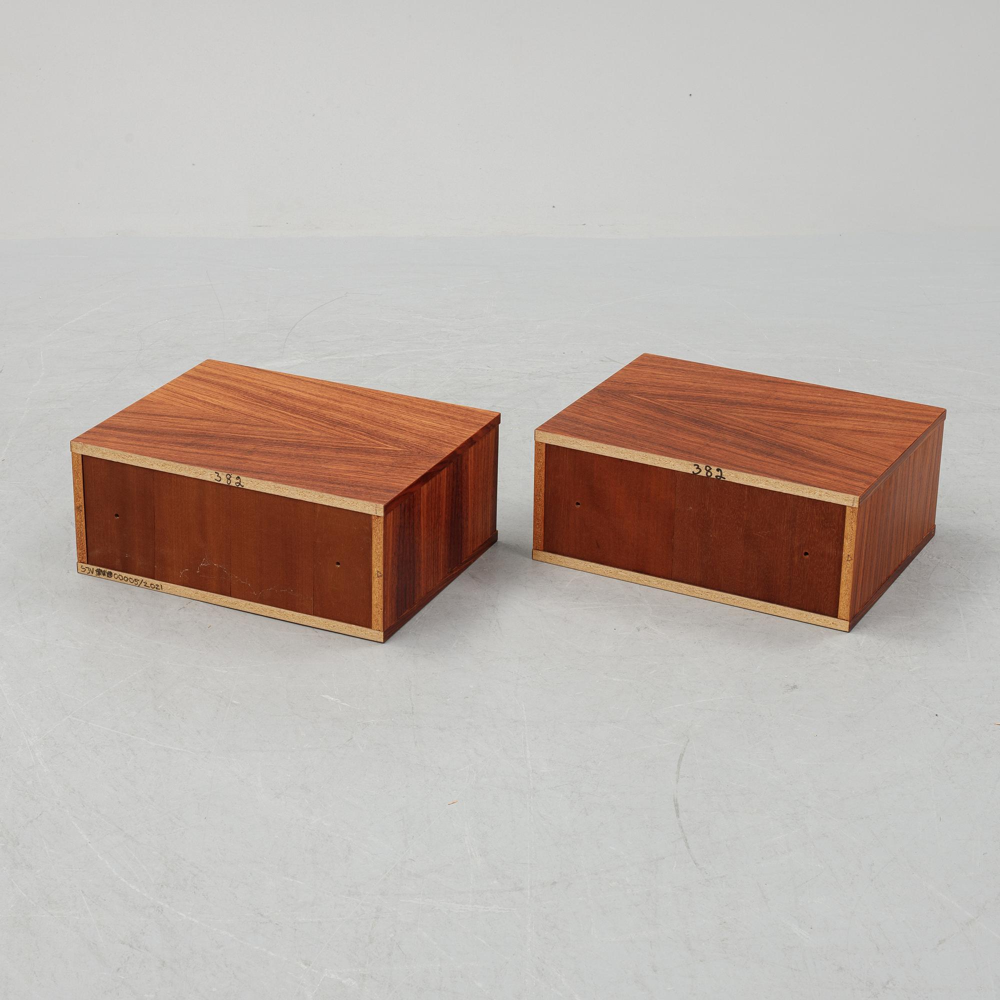 A pair of rosewood veneered coffee tables, 1960's/70's.