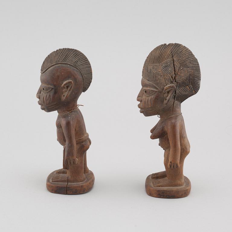 A pair of "Yoruba twins", Nigeria.