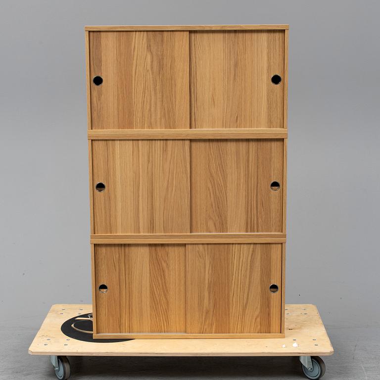 NILS STRINNING, 3 oak 'String' cabinets.