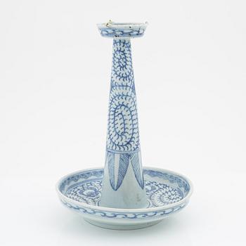 A blue and white Chinese candles stick/joss stick holder, circa 1900.