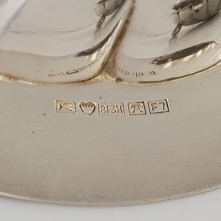 Osterimaljoja 12 kpl, hopeaa ja lasia. Auran Kultaseppä Turku 1959.