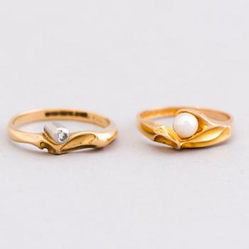 TWO BJÖRN WECKSTRÖM RINGS, pearl, diamond, 14K and 18K gold. Lapponia 1979-82.