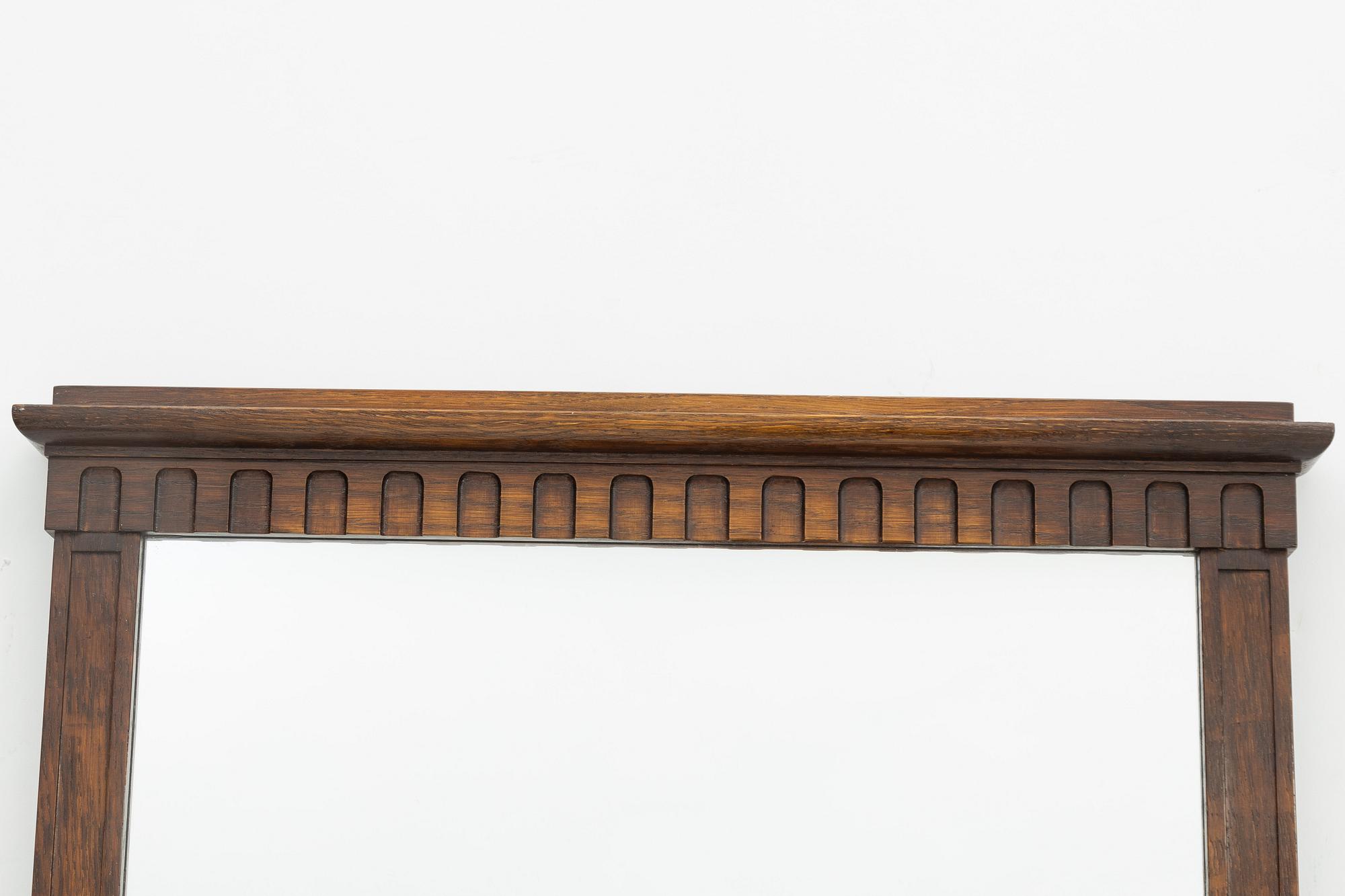 Hall furniture consisting of a chest of drawers and a mirror, first half of the 20th Century.