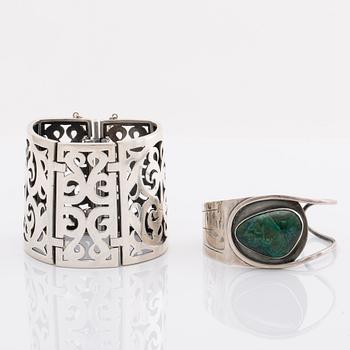 2 silver bracelets, 1 with a green stone, wider bracelet swedish import mark, original invoice dated 1977.