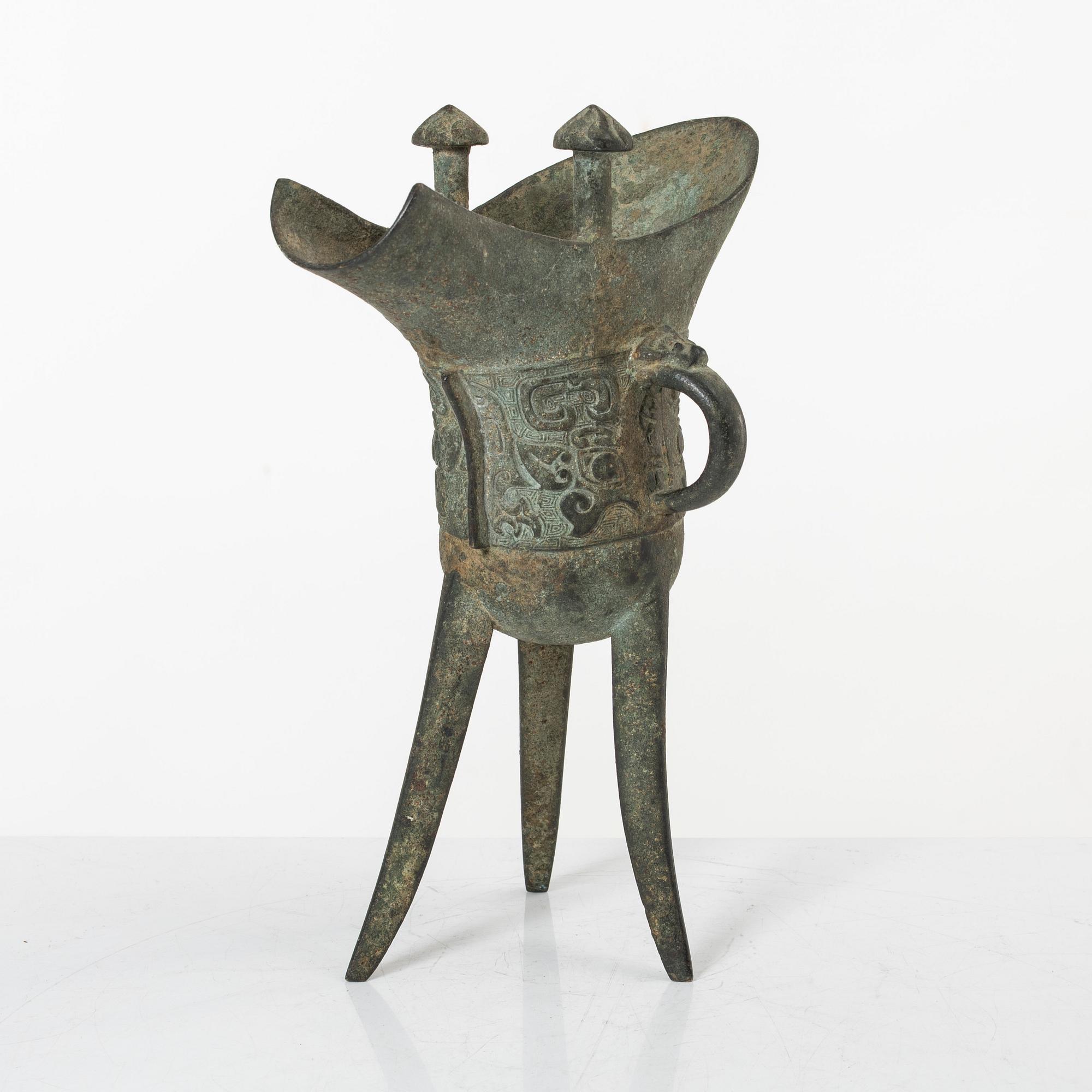 An archaisitic bronze Jue vessel, Qing dynasty.