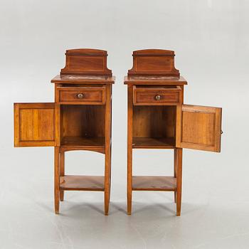 A pair of early 1900s bedside tables.