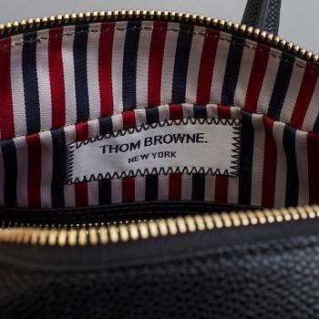 A "Hector Bag" by Thom Browne.