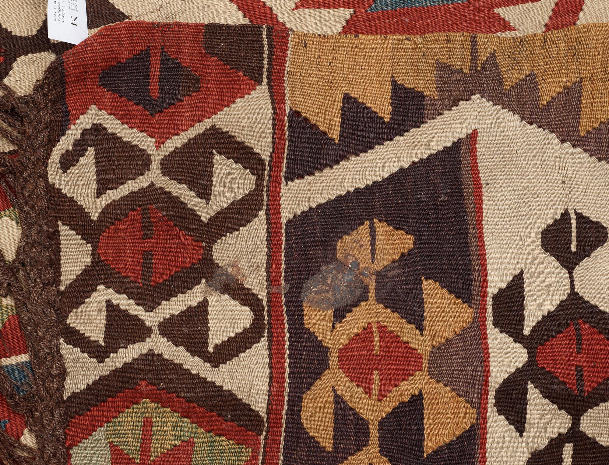 ANTIQUE ANATOLIAN KILIM, possibly Mut (south of Konya). 290,5 x 118 cm.