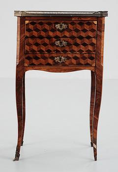 A Rococo-style 19th century commode.