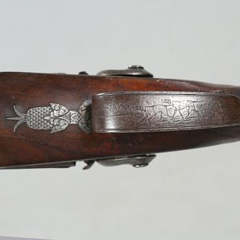 A percussion rifle by Charles William Lanchester in London, around the mid 19th century.