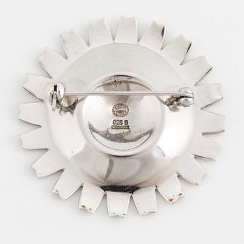 SMYCKESGARNITYR, 4 delar, Georg Jensen, 'Daisy,' sterlingsilver och svart emalj.