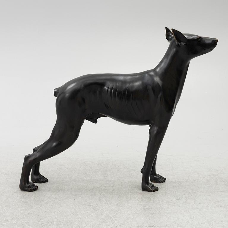 A decorative sculpture of a dog, 20th/21st century.