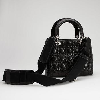 CHRISTIAN DIOR, a black leather "Lady Dior" bag.