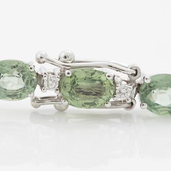 Bracelet 18K white gold with green sapphires and brilliant-cut diamonds.