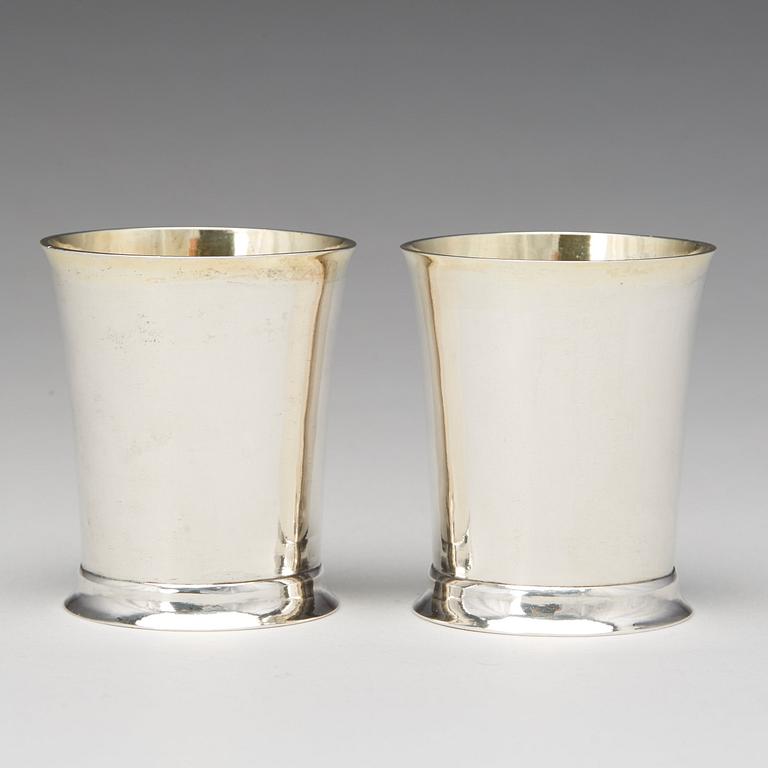 A pair of Swedish Empire parcel-gilt beakers, mark of Lorenz Georg Weis, Norrkoping 1814.