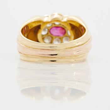 A WA Bolin ring in 18K gold set with rubies and round brilliant-cut diamonds.