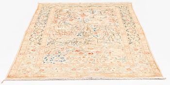 A part silk Theran rug, c. 216 x 136 cm.