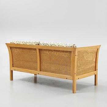 Arne Norell, a 'Rotang' sofa, Norells möbler, late 20th Century.