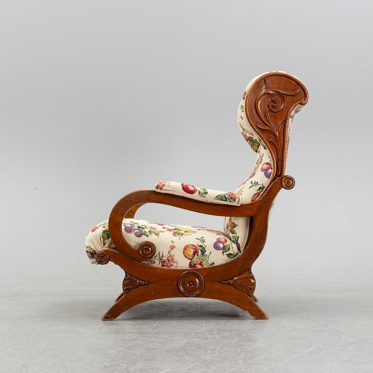 A late Empire easy chair, mid 19th century.