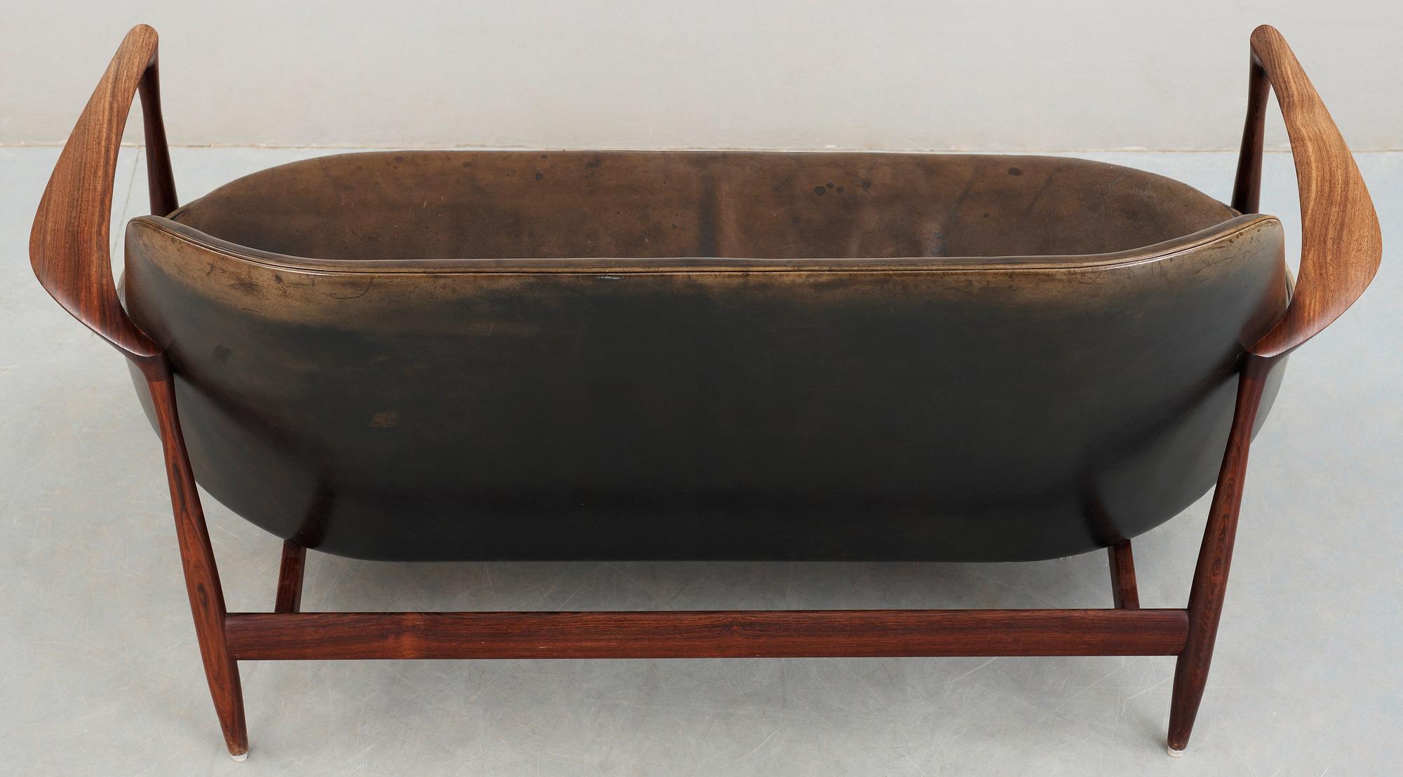 An Ib Kofod Larsen 'Elisabeth' palisander and black leather sofa, Christensen & Larsen, Denmark 1950-60's.
