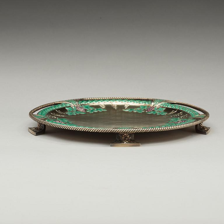 A Jean Jahnsson silver-gilt tazza with enamel decoration in green and purple, C.G. Hallberg, Stockholm 1914.