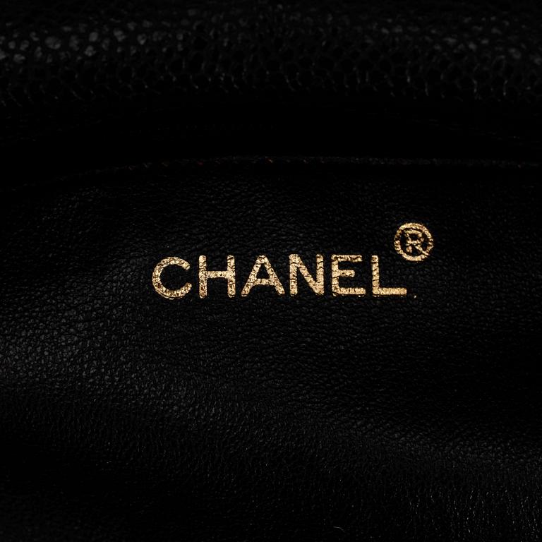 CHANEL, a black caviar leather shoulder bag.