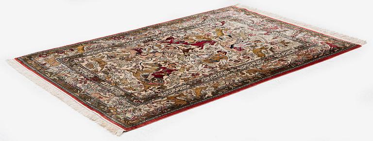 A silk Qum rug of 'hunting' design, c. 157 x 108 cm.