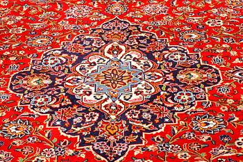 A Keshan rug, 400 x 295 cm.