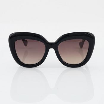 Moncler, a pair of black plastic sunglasses.