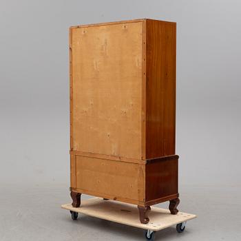 A mahogany veneered cabinet, first half of the 20th Century.