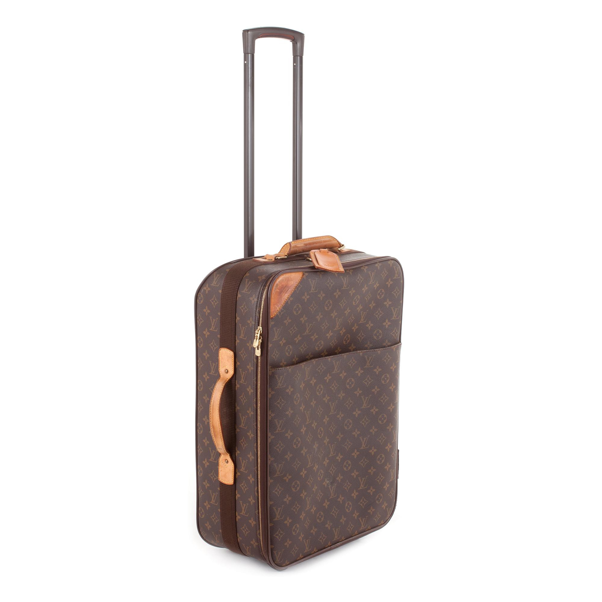 LOUIS VUITTON, a monogram canvas suitcase.