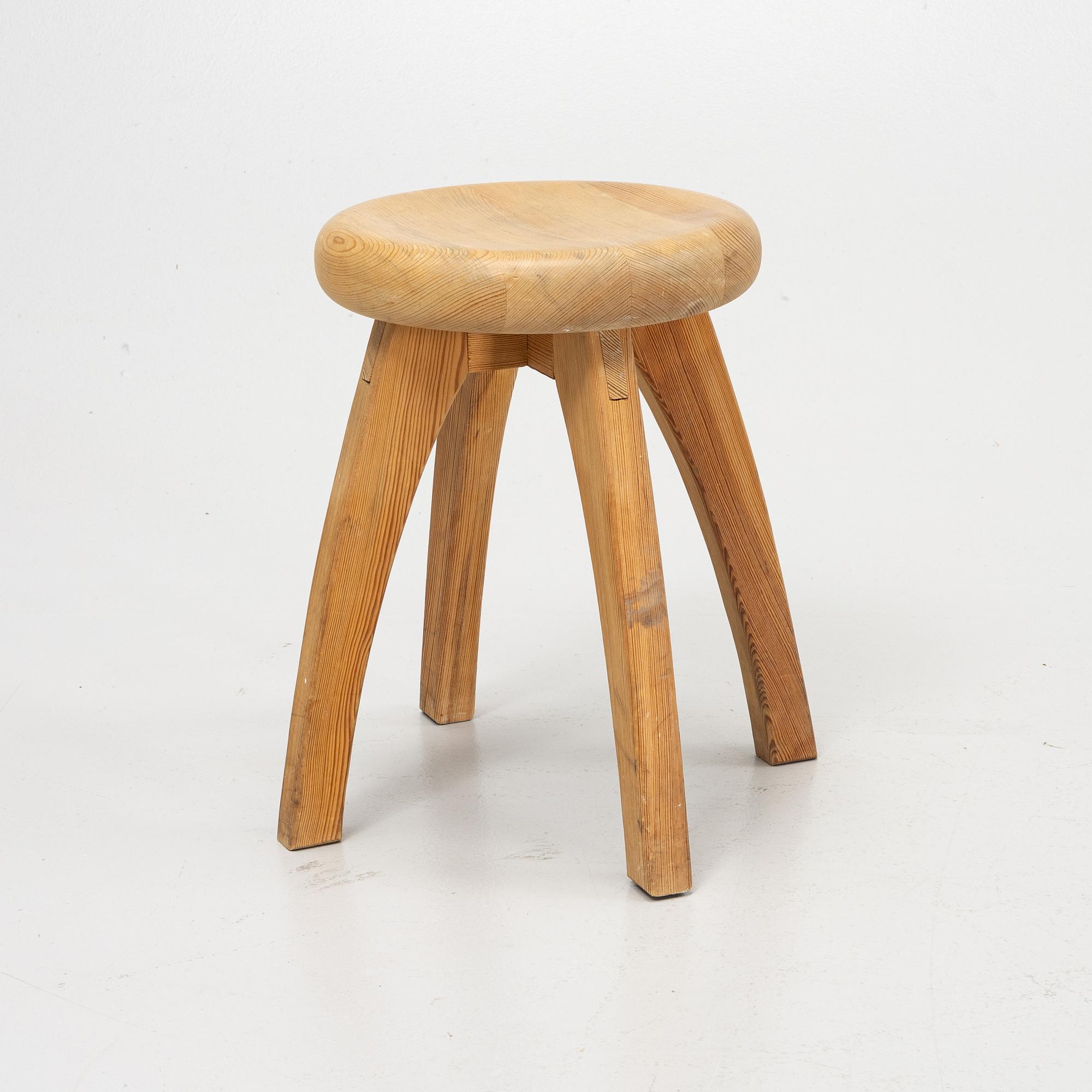 A pine stool, second half of the 20th Century.