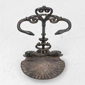 A cast iron umbrella stand, early 20th century.