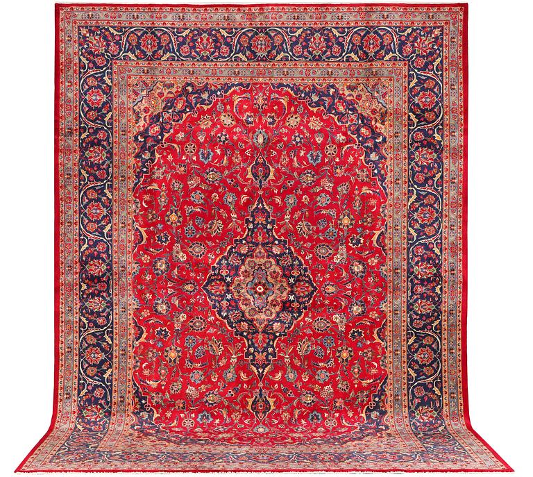 A Keshan carpet, c. 408 x 295 cm.