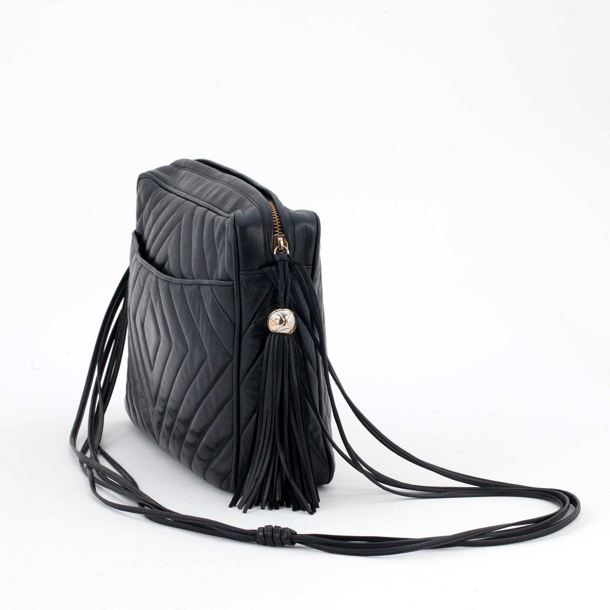 CHANEL,a black leather shoulderbag.