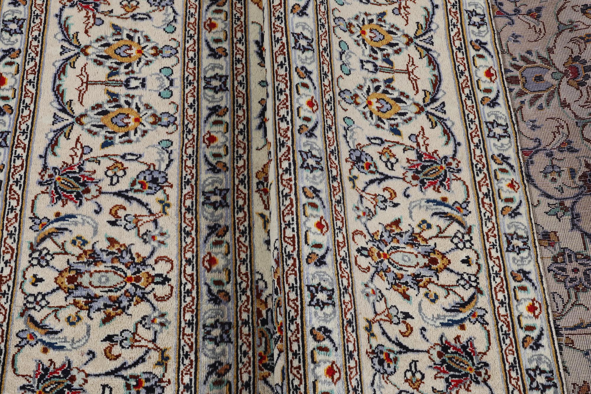 A carpet, Kashan, ca 345 x 238 cm.