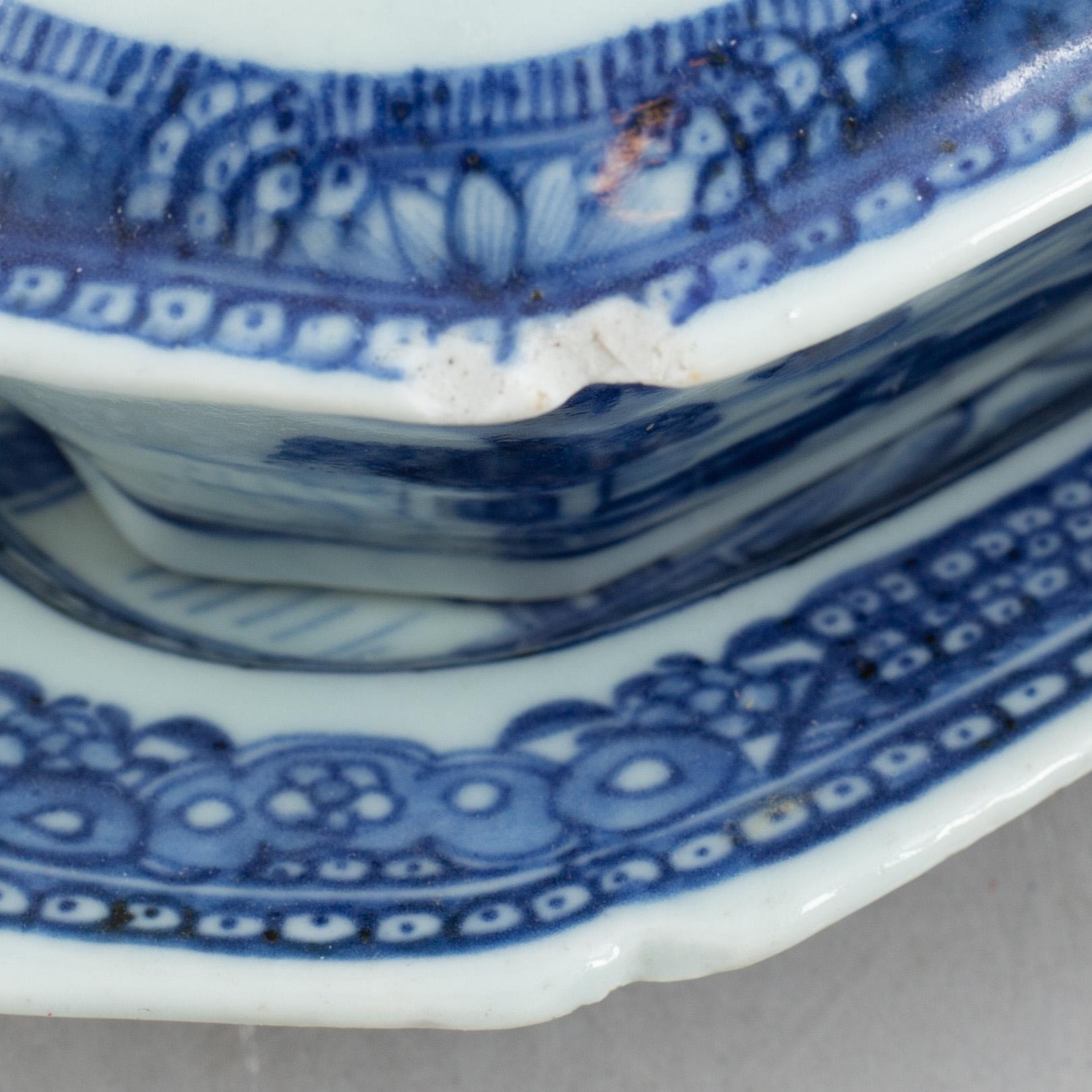 A pair of similar blue and white export porcelain butter dishes with stands and covers, China, Qianlong (1736-95).