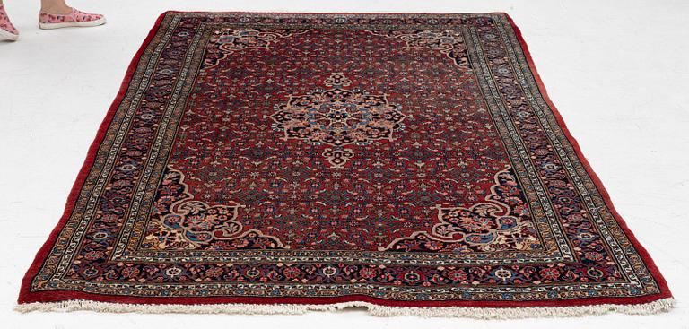 An old Bidjar rug, c. 225 x 143 cm.