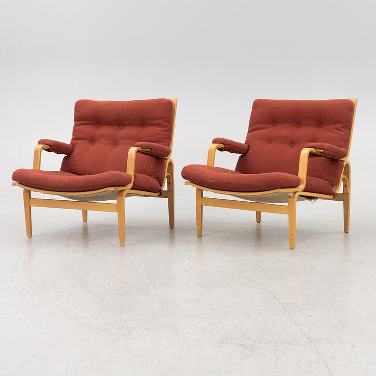 Bruno Mathsson, a pair of 'Ingrid' armchairs, Dux.