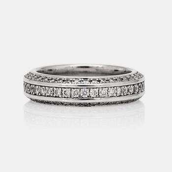 A brilliant-cut diamond eternity ring.