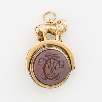 Seal, 14K gold with carnelian and monogram.