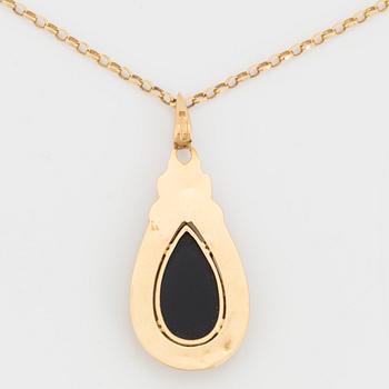 A chain and pendant, 18K gold with onyx.