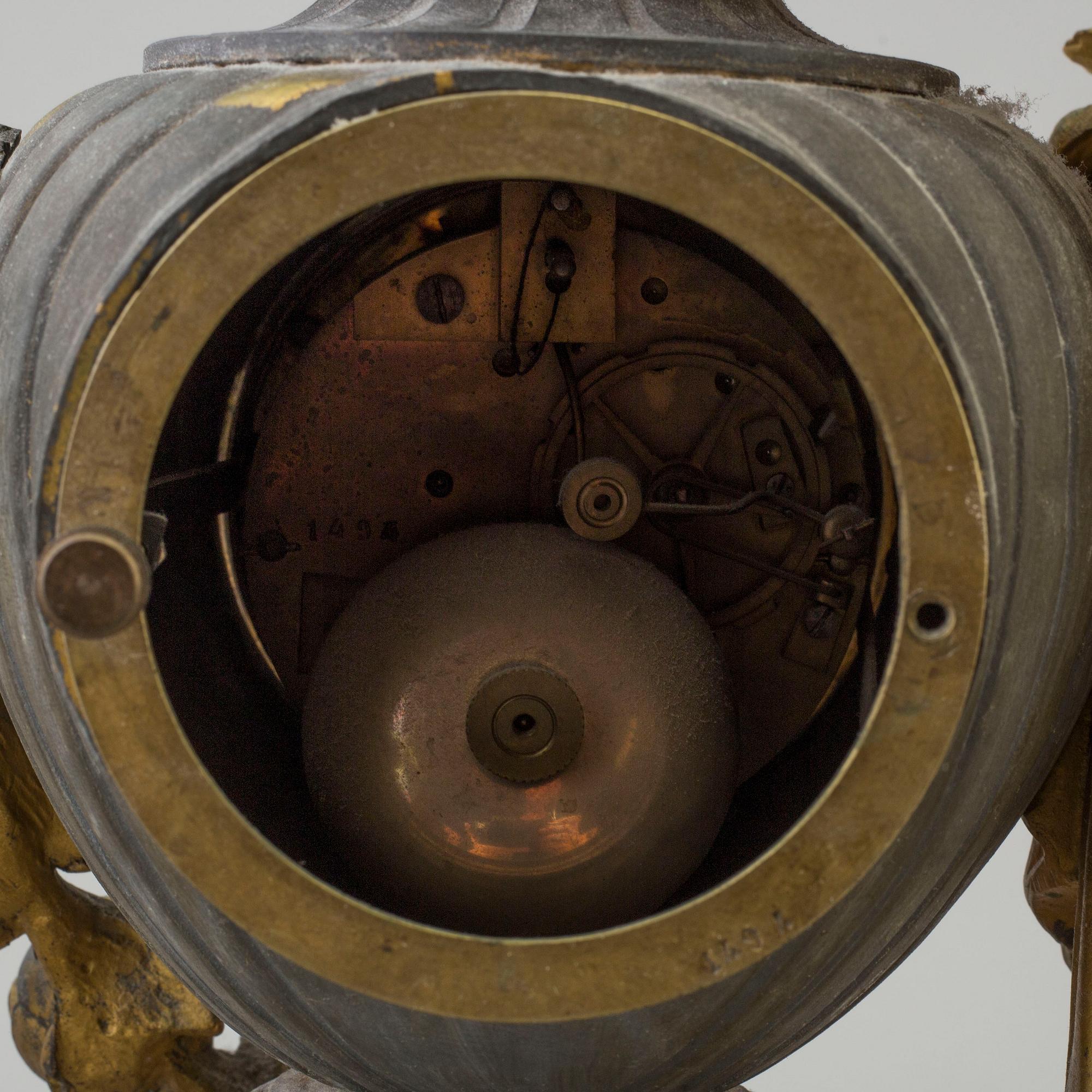 An end of the 20th century metal case mantle clock.