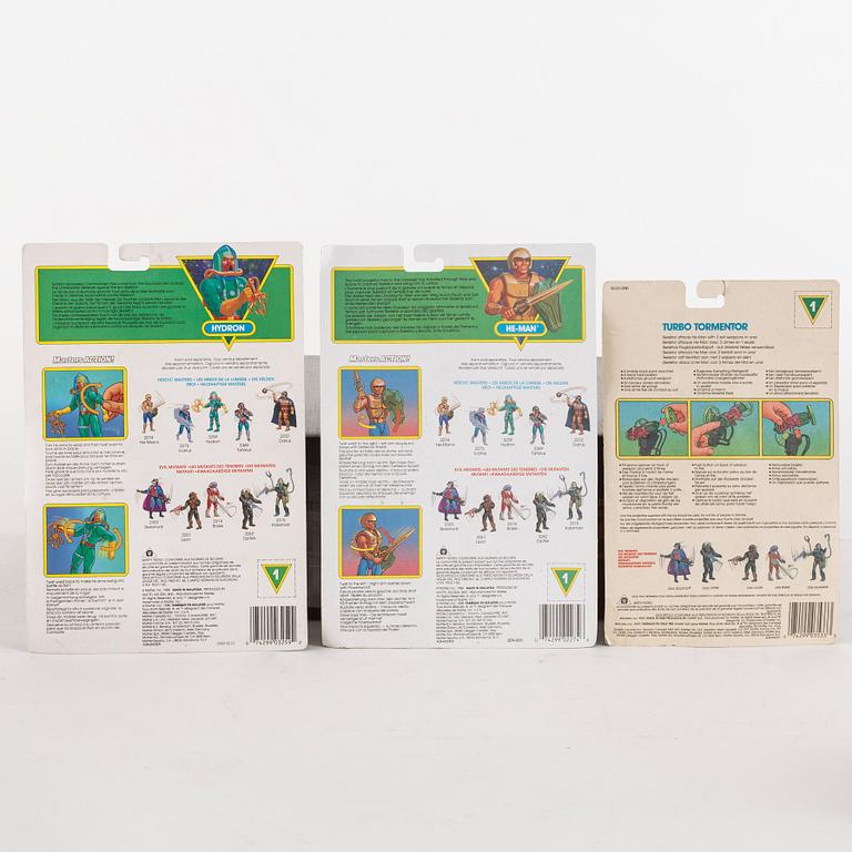 Thirteen He-Man action figures in their original packaging, Mattel, 1988.