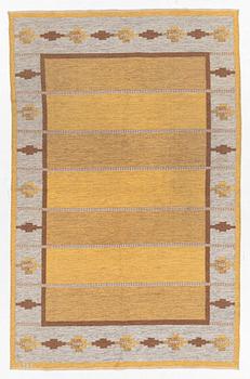 A flat weave rug, signed JH, c. 240 x 155 cm.