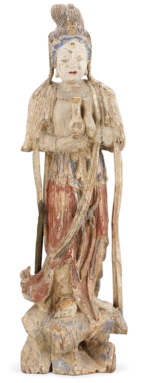 A wooden sculpture of Guanyin, Ming dynasty (1368-1644).